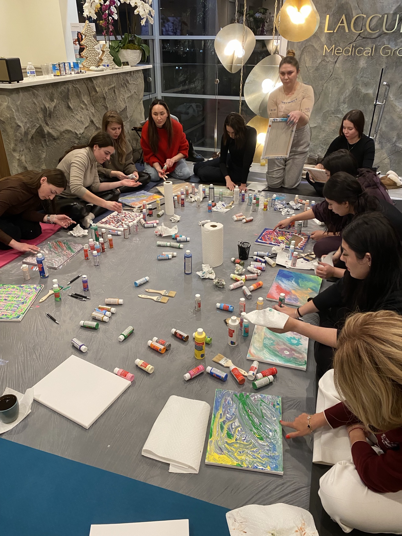 Indoor team participating in a corporate energy art session